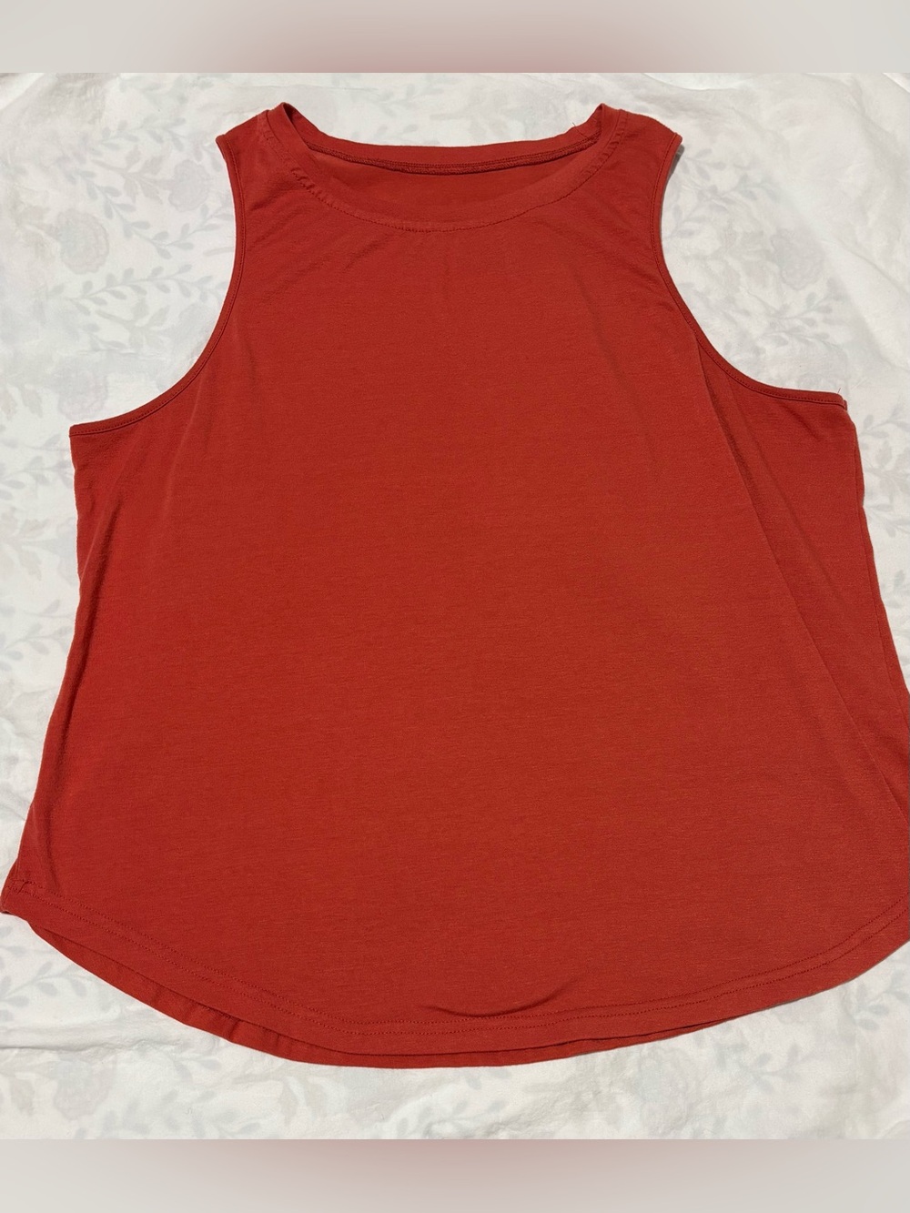 Red sleeveless top